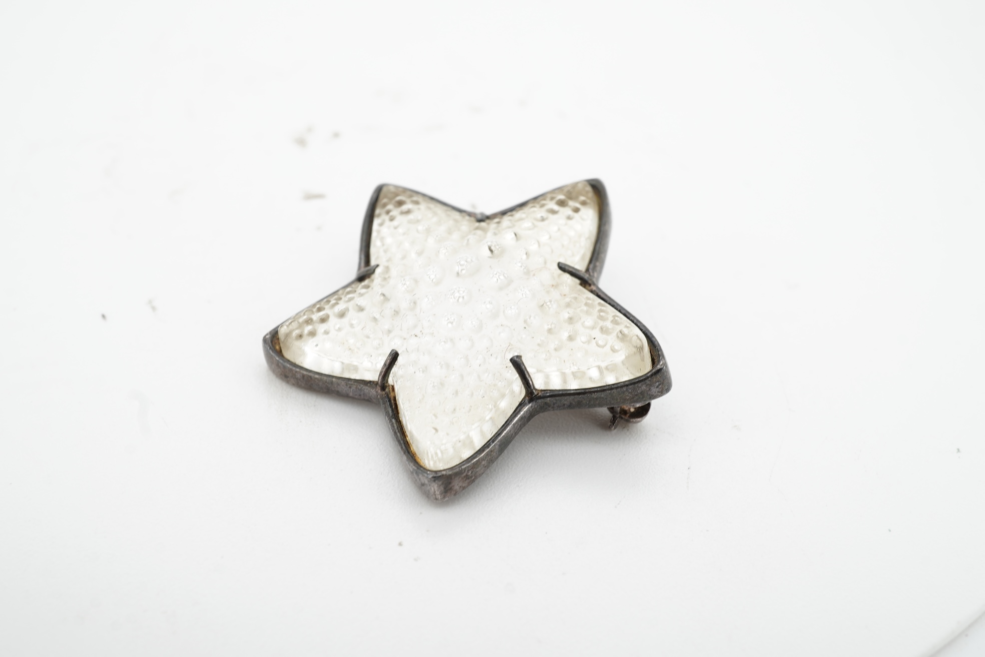Lalique, a silver and glass starfish brooch, length 3.3cm, signed Lalique, French assay mark for silver, French maker's mark
